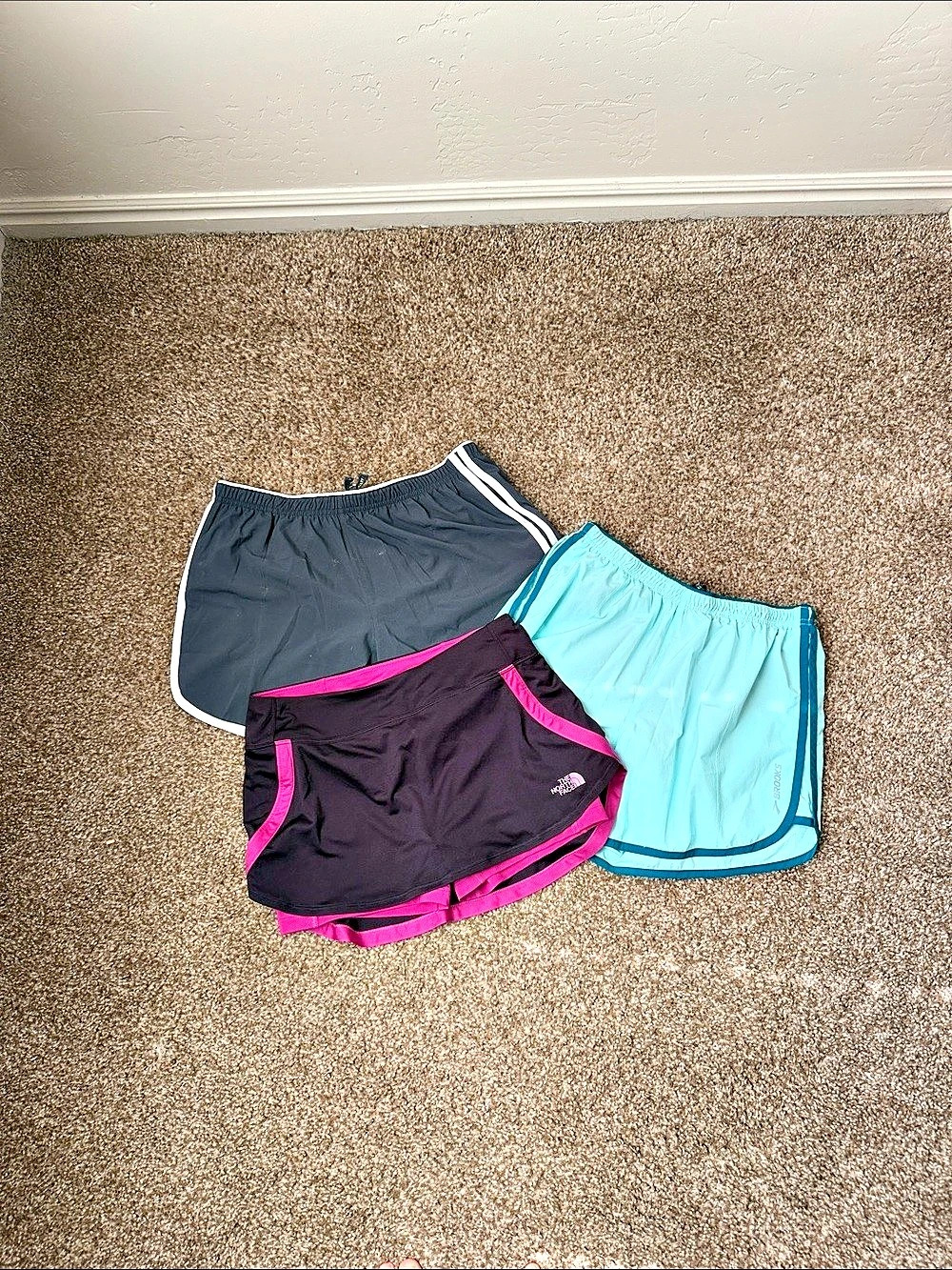 3 pack of running shorts: The North Face/Brooks